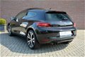 Volkswagen Scirocco - 1.4 TSI 160pk Edition * Xenon * Panoramadak * Half leer / blokstof * Multifunc - 1 - Thumbnail