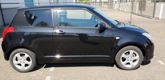 Suzuki Swift - 1.3 Exclusive - 1 - Thumbnail