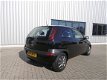 Opel Corsa - 1.2-16V Njoy Airco Zwart - 1 - Thumbnail
