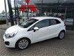 Kia Rio - 1.4 CVVT Plus Pack AUTOMAAT CLIMATE CONTROL CRUISE CONTROL LICHTMETALEN WIELEN - 1 - Thumbnail