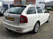 Skoda Octavia Combi - 1.8 TSI '11 aut/leder/xenon/navi/schdak/17'lmv/standkachel/nap - 1 - Thumbnail