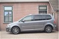 Volkswagen Touran - 1.6 TDI 105pk H6 Highline Leder Navigatie Ecc Pdc - 1 - Thumbnail