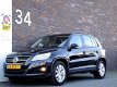 Volkswagen Tiguan - 2.0 TDI 4MOTION ECC/NAVIGATIE/LM VELGEN/PDC/CRUISE/CD/CV+AB - 1 - Thumbnail