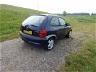 Opel Corsa - 1.2i-16V Strada Nieuwe APK - 1 - Thumbnail