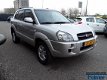 Hyundai Tucson - 2.0i CVVT StyleVersion 2WD - 1 - Thumbnail