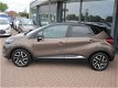 Renault Captur - 1.2 TCe Dynamique*AUTOMAAT*AIRCO*NAVIGATIE*CRUISE CONTROL* STOELVERWARMING*ACHTERUI - 1 - Thumbnail