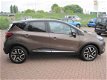 Renault Captur - 1.2 TCe Dynamique*AUTOMAAT*AIRCO*NAVIGATIE*CRUISE CONTROL* STOELVERWARMING*ACHTERUI - 1 - Thumbnail