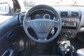 Kia Picanto - 1.0 l STUURBEKR. l RADIO l RIJKLAAR - 1 - Thumbnail