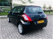 Suzuki Swift - 1.2 Exclusive EASSS AIRCO, Keyless, Boekjes - 1 - Thumbnail