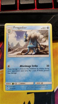 Frogadier 52/214 sm Unbroken Bonds - 1