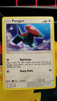 Porygon 154/214 sm Unbroken Bonds - 1