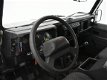 Land Rover Defender - 2.5 TD5 9 persoons / zeer netjes - 1 - Thumbnail