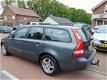 Volvo V50 - 1.8 Kinetic Clima / Cruise / Elec.Pakket / Xenon / Lm velgen / Trekhaak - 1 - Thumbnail