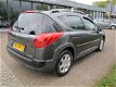 Peugeot 207 SW - 1.6 VTi XS OUTDOOR AUTOMAAT/NAVIGATIE/CLIMATE EN CRUISE CONTR./PANORAMADAK/PDC/LM - 1 - Thumbnail