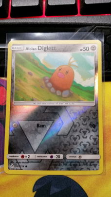 Alolan Diglett  121/214 (reverse) sm Unbroken Bonds