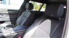 BMW 5-serie Touring - 520d High Exe Aut. M-PAKKET VOL OPTIES - 1 - Thumbnail