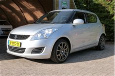 Suzuki Swift - 1.2 Comfort EASSS NL AUTO 5-DEURS AIRCO STOELVERWARMING LM-VELGEN #RIJKLAAR