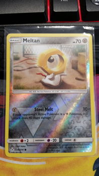 Meltan 128/214 (reverse) sm Unbroken Bonds - 1