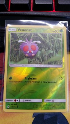 Venonat  10/214 (reverse) sm Unbroken Bonds