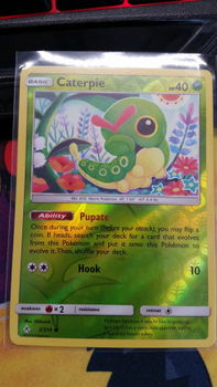 Caterpie 2/214 (reverse) sm Unbroken Bonds - 1