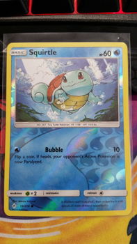 Squirtle 33/214 (reverse) sm Unbroken Bonds - 1