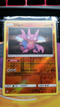 Gligar 98/214 (reverse) sm Unbroken Bonds - 1