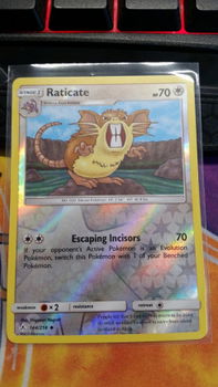 Raticate 144/214 (reverse) sm Unbroken Bonds - 1