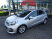 Kia Rio - 1.2 CVVT *NAVIGATIE* 15.000 KM * CAMERA CLIMATE CONTROL CRUISE CONTROL LICHTMETALEN WIELEN - 1 - Thumbnail