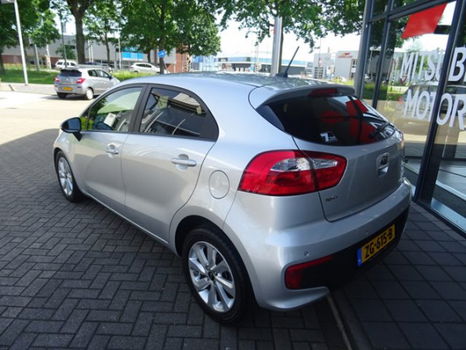 Kia Rio - 1.2 CVVT *NAVIGATIE* 15.000 KM * CAMERA CLIMATE CONTROL CRUISE CONTROL LICHTMETALEN WIELEN - 1