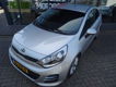 Kia Rio - 1.2 CVVT *NAVIGATIE* 15.000 KM * CAMERA CLIMATE CONTROL CRUISE CONTROL LICHTMETALEN WIELEN - 1 - Thumbnail