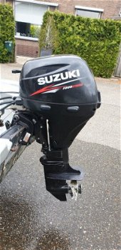 Suzuki 9.9 Elektrisch gestart - 1