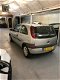 Opel Corsa - 1.0-12V Comfort airco inruil mogelijk - 1 - Thumbnail