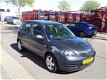 Mazda 2 - 2 1.4 Exclusive automaat airco - 1 - Thumbnail