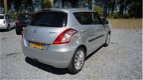 Suzuki Swift - 1.2 Exclusive 5deurs airco cruisct stoelverw 77dkm lm-velgen nw michelen banden zeer - 1 - Thumbnail