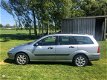 Ford Focus Wagon - 1.6-16V Ambiente 14mndnAPK/AIRCO/LEDEREN BEKLEDING - 1 - Thumbnail