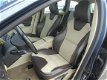 Volvo XC60 - 2.4D AWD Moment. Navi Two-Tone Leer High Perf. Audio Ecc Cruise PDC - 1 - Thumbnail