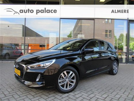 Hyundai i30 - FIRST EDITION | RIJKLAAR | NAVIGATIE | CRUISE CONTROL | CLIMATE - 1