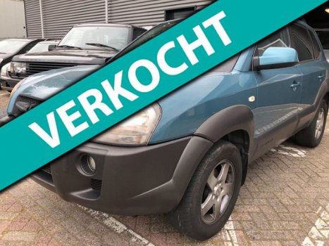 Hyundai Tucson - 2.0i Dynamic apk 04-04-2020 airco elektrische ramen+spiegels cruise controle lm-vel - 1