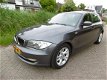 BMW 1-serie - 116i Business Line 5 deurs Airco PDC Onderhoudshistorie 2e eig - 1 - Thumbnail