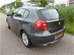 BMW 1-serie - 116i Business Line 5 deurs Airco PDC Onderhoudshistorie 2e eig - 1 - Thumbnail