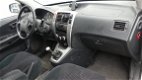 Hyundai Tucson - 2.0i Dynamic 140 pk ( Trekhaak , Bluetooth ) - 1 - Thumbnail