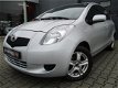 Toyota Yaris - 1.0 VVTi + / Stuurbekr. / Lmv / Elektr. Spiegels - 1 - Thumbnail