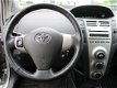 Toyota Yaris - 1.0 VVTi + / Stuurbekr. / Lmv / Elektr. Spiegels - 1 - Thumbnail