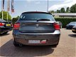 BMW 1-serie - 120d High Exe M sportpakket extreem vol alcantara/navi pro/pdc voor en achter/schuifka - 1 - Thumbnail