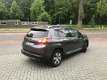 Peugeot 2008 - 1.6 e-HDi Blue Lease Executive BJ 2013 - 1 - Thumbnail