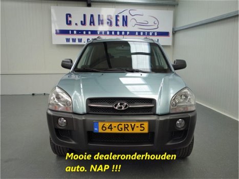 Hyundai Tucson - 2.0i Dynamic AIRCO. CRUISE C. L.M.VELGEN - 1