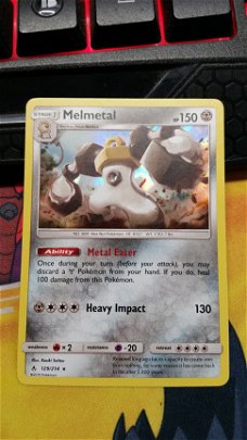 Melmetal  129/214 Holo sm Unbroken Bonds