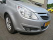 Opel Corsa - 1.4-16V EDITION NAV - 1 - Thumbnail