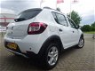 Dacia Sandero - TCe 90 PK Stepway Lauréate 1e EIGENAAR, SLECHTS 28000 KM GEREDEN, DERHALVE IN ABSOLU - 1 - Thumbnail