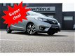 Honda Jazz - 1.3 i-VTEC Elegance Bluetooth/Camera/DAB/Navi/PrivacyGlass/PDC/Velgen RIJKLAAR €14.998 - 1 - Thumbnail